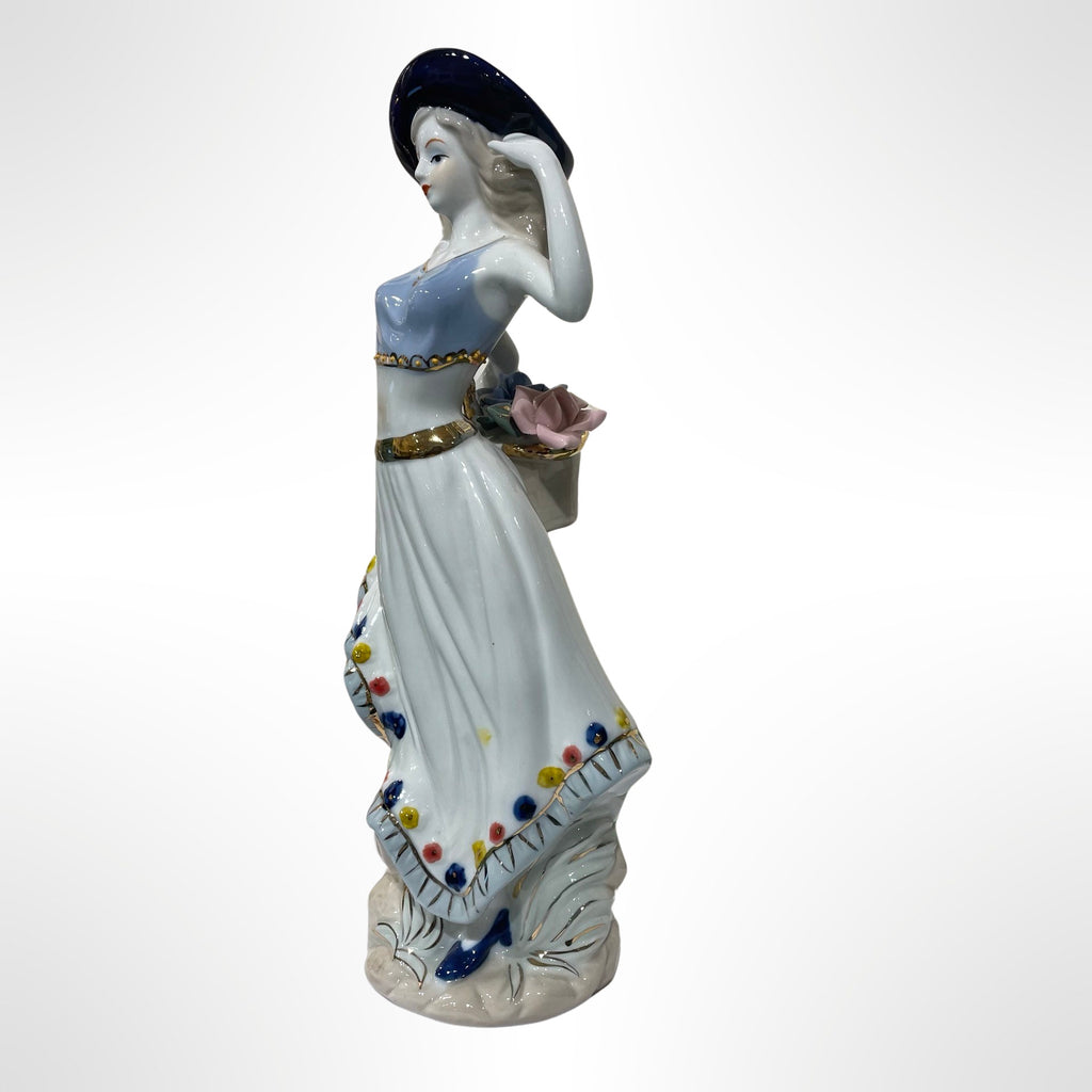 Figurine of Alice with Big Flower Basket