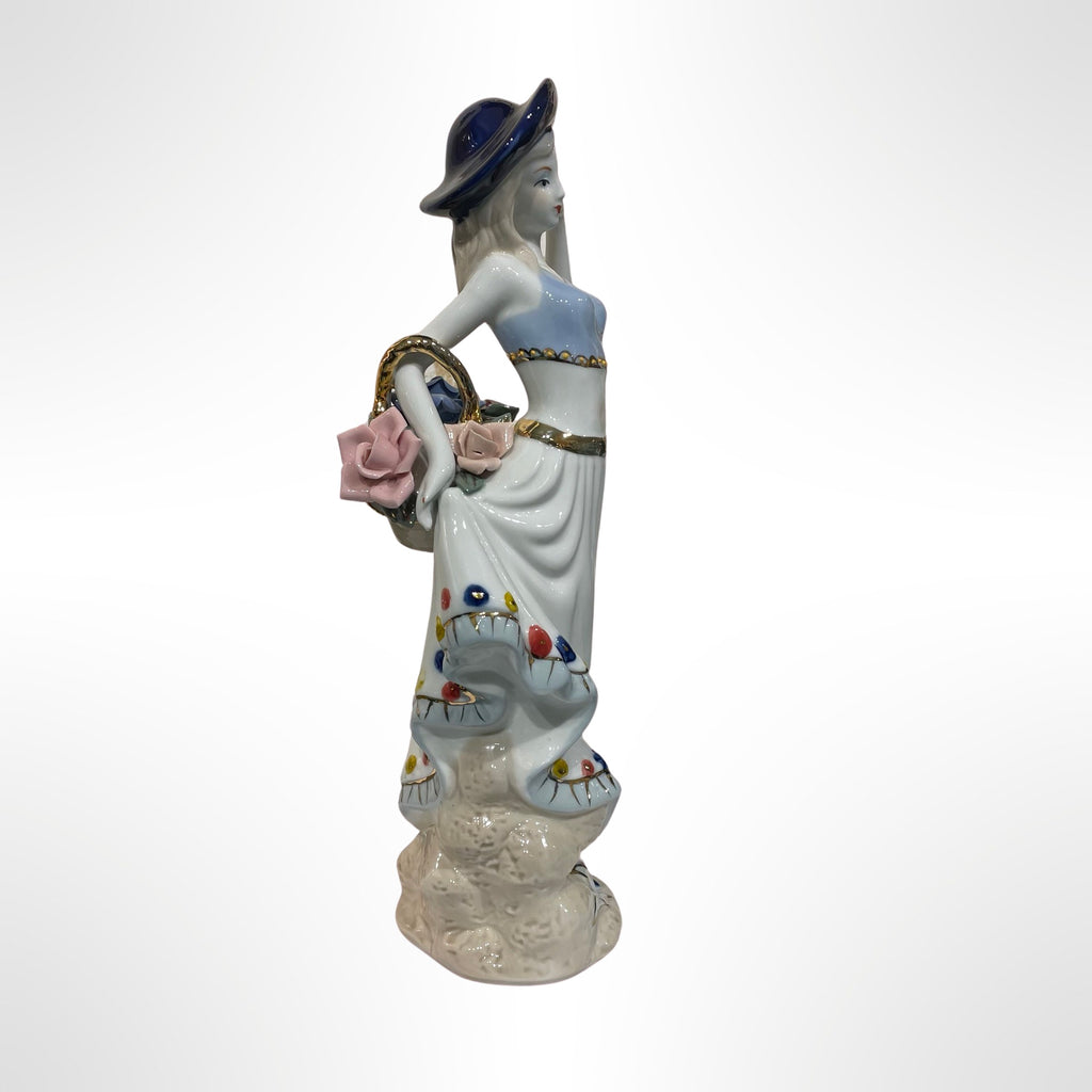 Figurine of Alice with Big Flower Basket