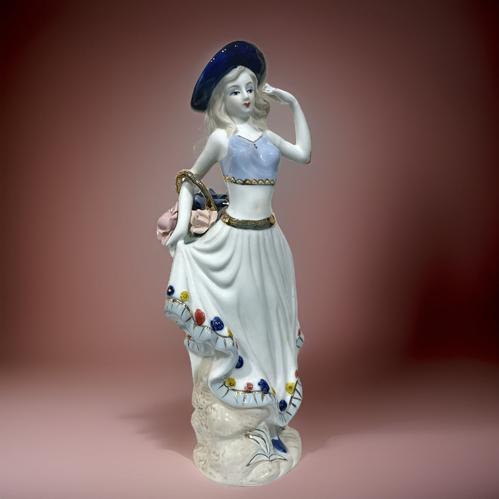 Figurine of Alice with Big Flower Basket