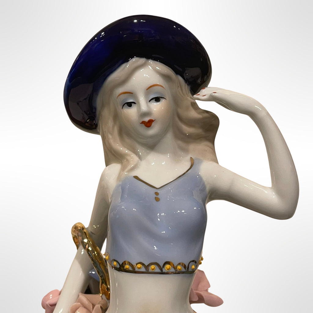 Figurine of Alice with Big Flower Basket